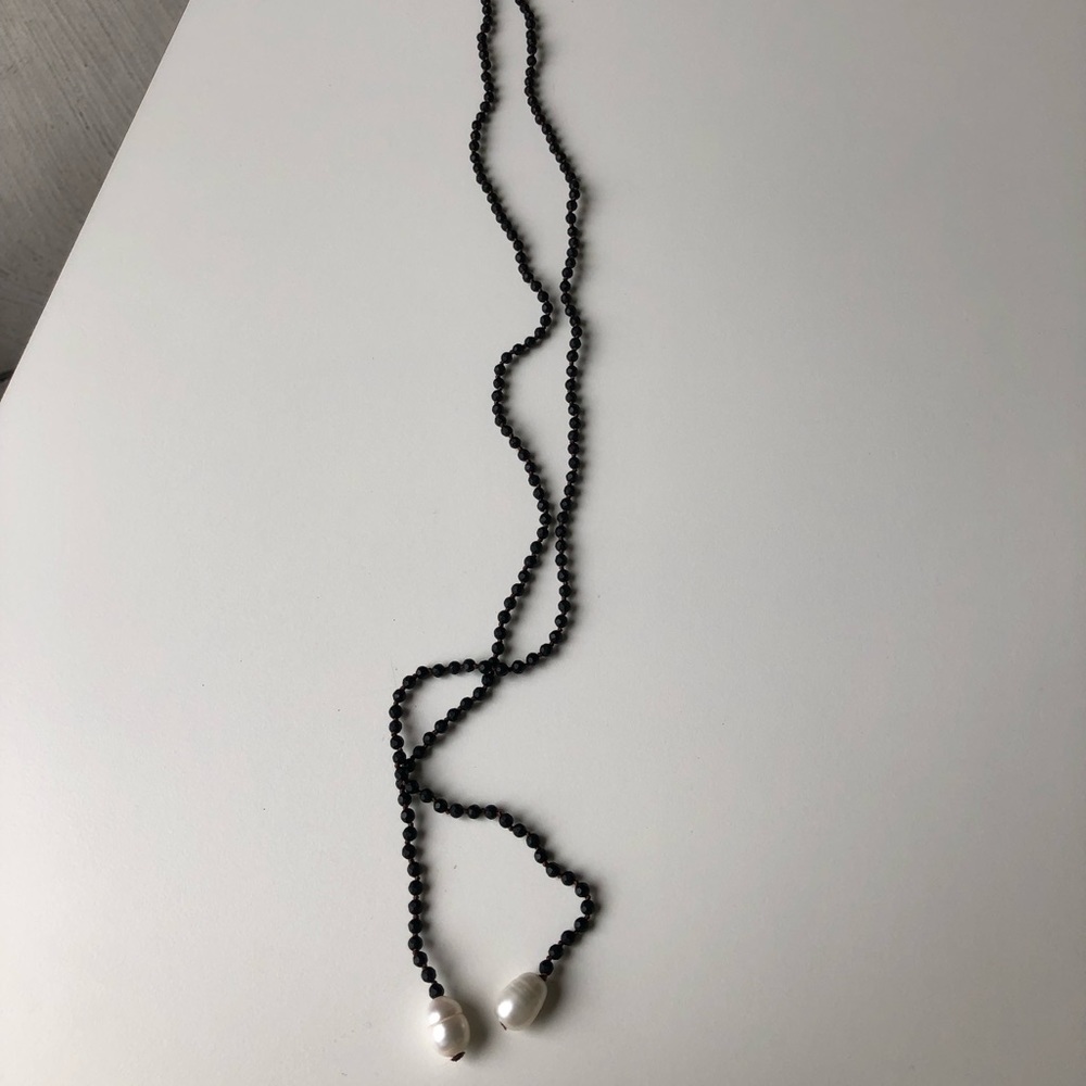 Black beaded necklace with freshwater white pearls